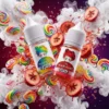 MAMASAN 媽媽桑 30ml 尼古丁鹽煙油主圖。畫面展示帶有女性頭像標誌的瓶身，環繞飛濺的繽紛彩虹糖果 (Skittles)、新鮮山楂果實、冰塊、薄荷葉與綿密的白色煙霧視覺。強調 2026 年進口煙油界黑馬的創新酸甜口感，搭配 40mg 高解癮丁鹽與丁鹽技術，帶來細膩絲滑且極具層次感的味蕾狂歡，專為小煙設備優化。